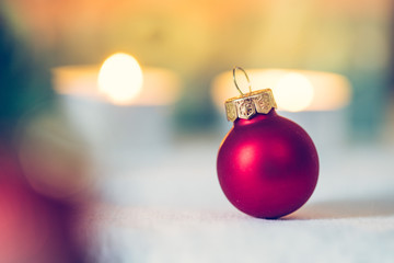 Red Christmas balls with decoration on shiny background