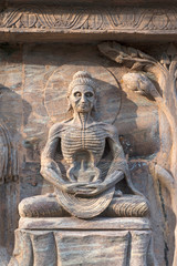 Stone statue of buddha at Mahabodhi Temple Complex in Bodh Gaya, India