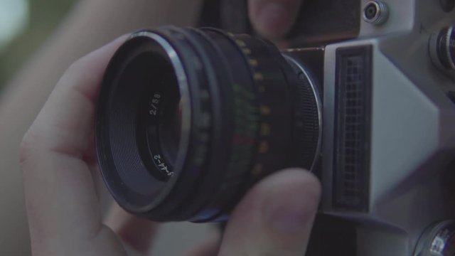  the guy with the cameras. the guy is setting the camera