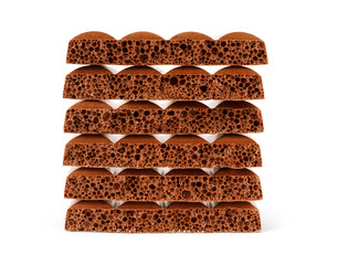 Stack of milk chocolate on white background