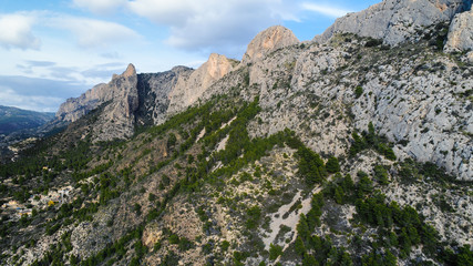 Roks and fields with cloudy sky and sun shotted for drone air view  