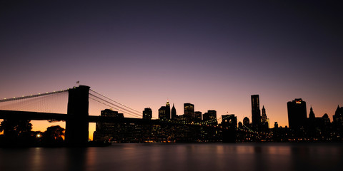 new york city skyline at sunset brooklyn bridge