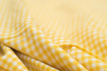 white and yellow checkered tablecloth