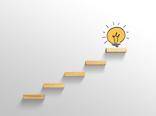 light bulb on stairs, increase size, business successful concept