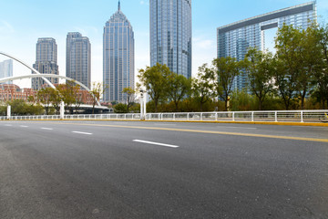 Empty road floor surface with modern city landmark buildings of hangzhou bund Skyline,zhejiang,china