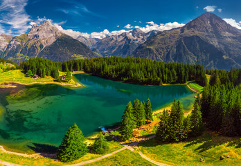 Fototapeta na wymiar Areal view of Arnisee with Swiss Alps. Arnisee is a reservoir in the Canton of Uri, Switzerland, Europe