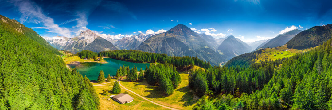 Areal view of Arnisee with Swiss Alps. Arnisee is a reservoir in the Canton of Uri, Switzerland, Europe