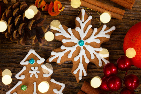 christmas gingerbread snowflake cookie with spices and decorations close up