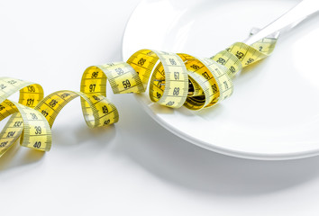concept diet and weight loss on white background top view