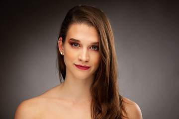 Naklejka premium Beauty portrait of cute young brunette caucasian woman 