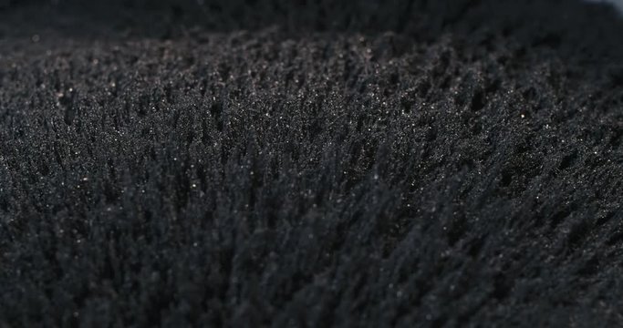 Iron powder under the influence of a magnetic field. Abstract background.