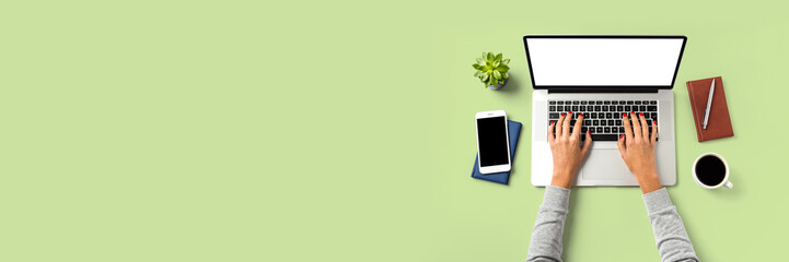 Overhead shot of woman working on laptop