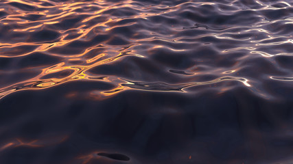 sea waves at sunset, close up