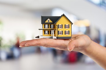 Building, mortgage, real estate and property concept - close up