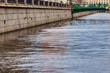 Low bridge over narrow channel, St Petersburg, Russia