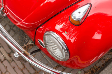 Obraz na płótnie Canvas Red vintage car. Top view. Detailed view. Groningen, The Netherlands, Holland.