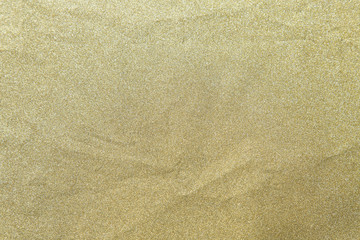 Fototapeta na wymiar Golden glitter shiny paper be crumpled for christmas background, Celebration concept.