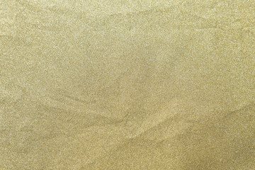 Golden glitter shiny paper be crumpled for christmas background, Celebration concept.