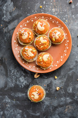Carrot Halwa Laddu or sweet balls,  served in a plate with dry fruits toppings. selective focus