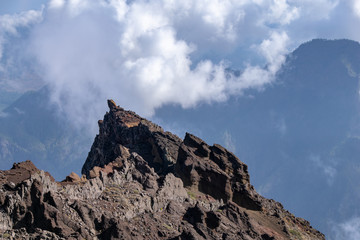 Clouds forming over the mountains and volcanic ridge at Roque de los Muchachos on La Palma, Canary Islands