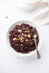 Beetroot Halwa garnished with Pistachio served in a bowl, selective focus