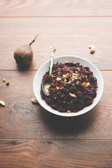 Beetroot Halwa garnished with Pistachio served in a bowl, selective focus