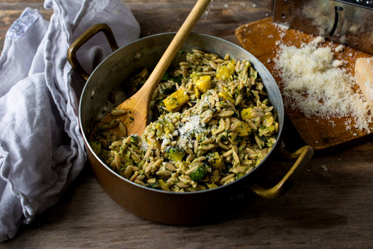 Close up of summer squash with pesto in casserole
