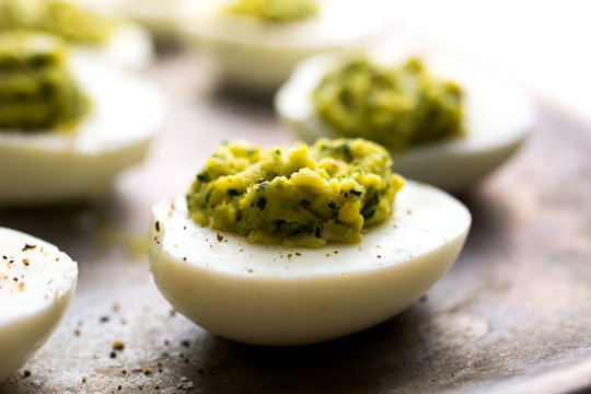 Close Up Of Pesto Filled Deviled Eggs
