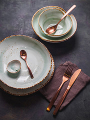 Set of modern tableware. Plates and cutlery