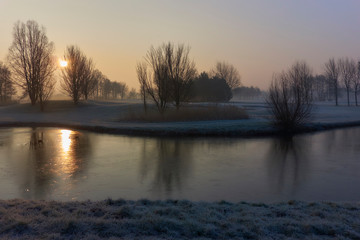 Frosty golf terrain at daybreak