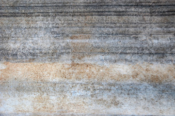 The texture of the rough surface of the marble slab