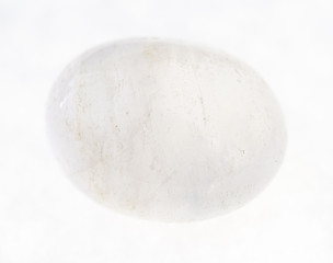 polished white translucent agate stone on white