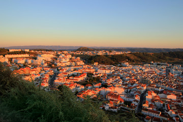 Fototapeta na wymiar Pretty town Nazare at sunset, Portugal