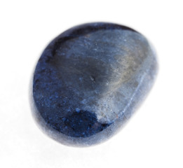 polished dumortierite gemstone on white