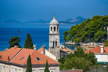 Fototapeta premium View of the church tower and the bay in Cavtat, Croatia.