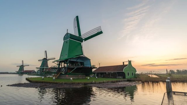 Dutch Windmill sunrise time lapse at Zaanse Schans Village, Amsterdam Netherlands timelapse 4K