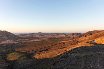 Fototapeta na wymiar Sunset in the mountains of Fuerteventura. Canary Islands. Spain