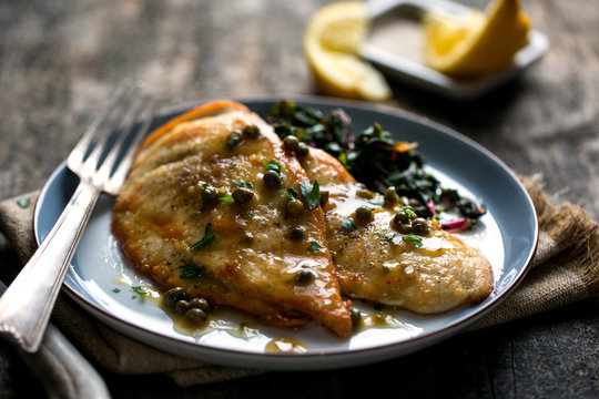 Close up of chicken, lemon and garlic chicken with mushrooms

