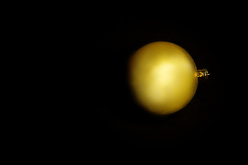 golden ball on black background