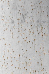 texture of painted grey metal with corrosion points.