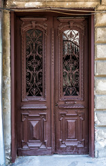 Fototapeta na wymiar Traditional classic style wooden medieval vintage brown painted door