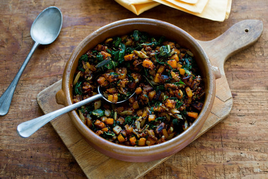 Close Up Of Food Served In A Bowl On Cutting Board