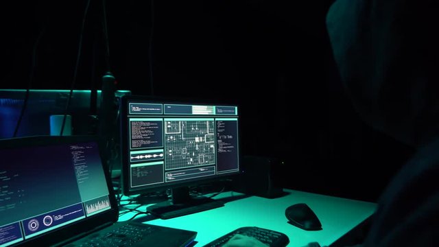 Hackers breaking server using multiple computers and infected virus ransomware. Cybercrime, technology, phishing mail concept.