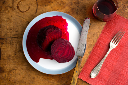 Overhead view of sliced beetroot on plate