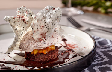 Chocolate cake with cottage cheese cream and canned peach.