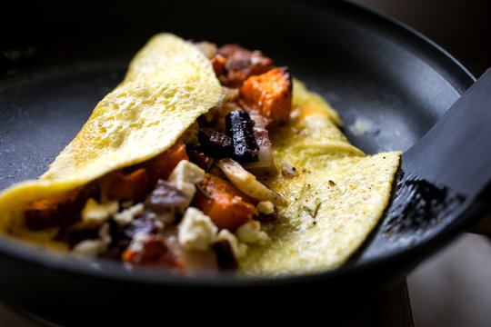 Close up of roasted vegetable omelette in frying pan