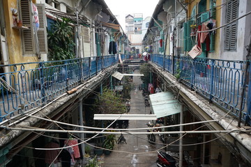 Block of houses at Hao Si Phuong alley in District 5, Ho Chi Minh City. This 100 years old ancient...