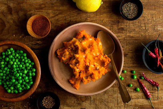 Overhead view of potato and pea patties mixture