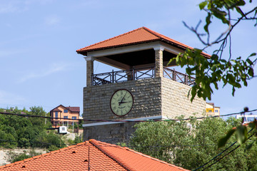 the clock on the building on the street