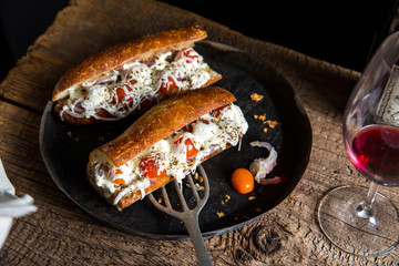 Close up of pissaladierre baguette served on plate 